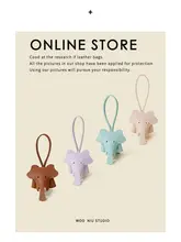 可愛らしいゾウデザインのレザーキーホルダー【バックル付き・多用途・キャラクターアクセサリー】