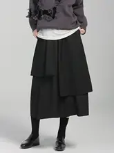 デザイン性の高いおしゃれな黒の不規則なレイヤースカート【春向け・高腰・Aライン・スリット付き】