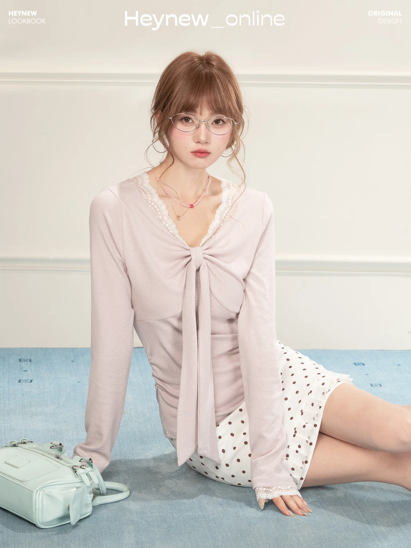 春にぴったりの蝶結びデザインの長袖Tシャツ【レーストリム・ウエストシェイプ・女性用・イエロー】