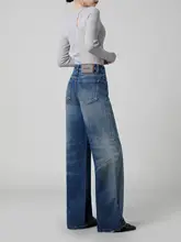 特徴的なウォッシュドワイドレッグデニムパンツ【女性用・ルーズフィット・ブラッシュ加工】