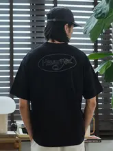ヴィンテージ風 バックプリントデザインのゆったりショートスリーブTシャツ