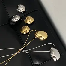 几何学的な楕円形ペンダントのニットネックレス【エレガントなデザイン・色褪せないイヤリング付き】