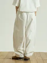 シンプルな白いカジュアルパンツ【男女兼用・ウエストゴム・ワイドレッグ】（セットアップ対応）
