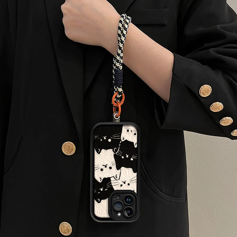 秋冬用黒白猫デザインのスマホケース：iPhone用保護カバーの実用性とデザイン性