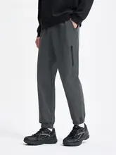 Xtep 束脚デザインの黒いトレーニングパンツ【春秋用・ストレッチ素材】