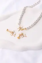 １８Ｋゴールドパール付き花モチーフのジルコニア接続金具【ハンドメイド・DIY用・ネックレス・ブレスレット各種用】