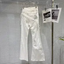 トレンドの流行にぴったり！トッパー刺繍デザインのフリンジ付きデニムパンツ【フレア・レディース】