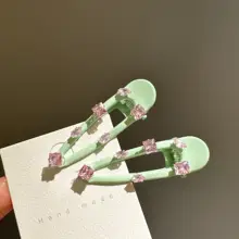 薄荷グリーンのリボンデザインヘアクリップ【キラキラしたジルコン・高級感】