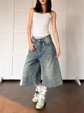 水洗い加工の折り目入り七分丈デニムパンツ【ユニセックス・クリーンフィット・ゆったりワイド】