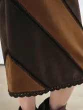 レトロデザインの斜裁切替ブラウンスエード調スカート【針抜き花模様・レイヤード】