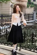 ドレープ感のある黒の不規則Aラインスカート【秋用・ハイエンドデザイン・大きいサイズ】