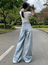 浅い色合いのフレアワイドレッグデニムパンツ【アメリカンヴィンテージ・ハイウエスト・スリム効果・ダメージデザイン】
