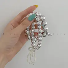 FUNCOCO シルバー パール ヘアゴム＆ブレスレット【リボンデザイン・韓国風】