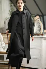 黒いトレンチコート ミディアム丈 バイアスシェイプ 多様な着こなし