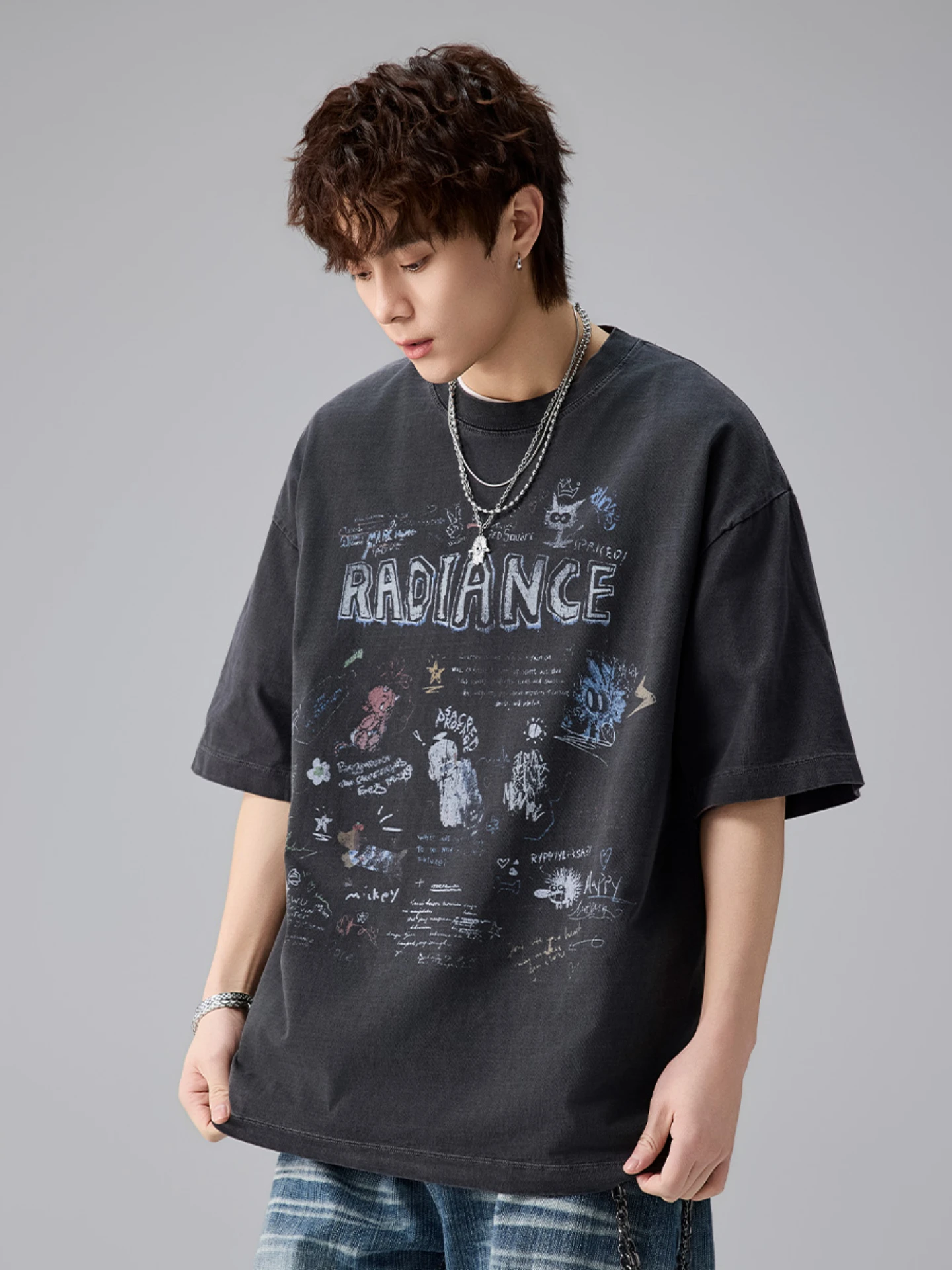 アメリカンストリートスタイルのグラフィックTシャツ：青春流行に合うゆったりフィットの夏用アイテム