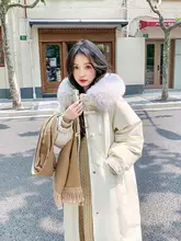 魅力的なデザインの中長ファーコート【あたたかい・膝丈・冬用】