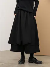 不規則な多層デザインの九分丈ワイドパンツスカート