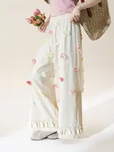 立体花飾りのレースワイドパンツ【春向け・アプリコット色・甘いフリル付き・スタイル】