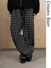クラシックな黒白チェック柄のウエストゴム男女兼用ワイドパンツ