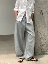 シンプルなドレープのカーブパンツ【男女兼用・カジュアル・ルーズフィット】（セットアップ対応）