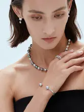 純銀製のダブルレイヤーリング【パールとダイヤモンド装飾・シンプルで洗練されたデザイン】