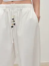 珠串付きドローコードワイドレッグパンツ【女性用・ホワイト・コットン・デザイン】