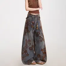 花柄フロッキー付きデニムパンツ【アメリカンデザイン・ウォッシュ加工・レトロ・ワイドレッグ】