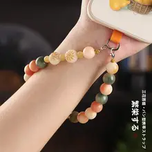 菩提デザインのスマホ用ハンドストラップ【女性向け・精緻な装飾・ビーズ付き】