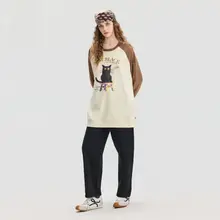 黒猫デザインのアイボリーカラーゆったりとしたラウンドネックスリーブレスパーカー【秋冬用・女性用】（セットアップ対応）