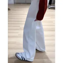 白色のゆったりワイドレッグデニムパンツ【ハイウエスト・スリム効果・レディース】
