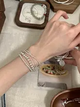 シンプルデザインの銀色ビーズエラスティックブレスレット【高級感ある手元を演出】