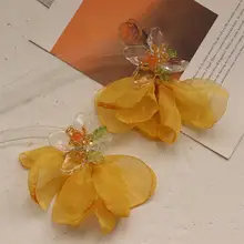 個性的な黄色の花のイヤリング【誇張デザイン・ピアス＆イヤースティック】