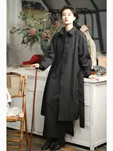 黒いトレンチコート ミディアム丈 バイアスシェイプ 多様な着こなし