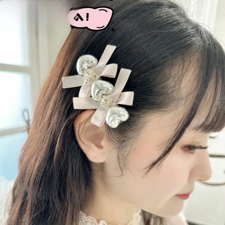 銀色のハート型リボンデザインの水晶バンスクリップ【可愛い・手作り・女性用】