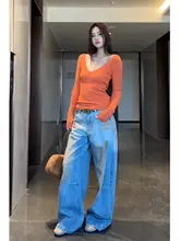 オレンジのVネックニットセーター【レトロなツイストデザイン・スリムフィット・長袖】