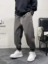 春と秋のスウェットパンツメンズハンサムハイストリートハーレムレギンス