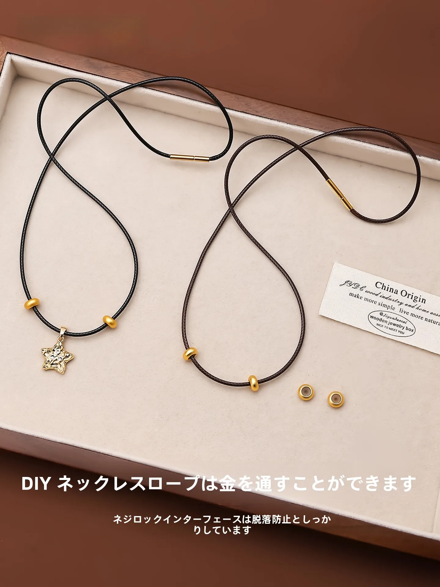 18金ネックレス レディース 人気 おすすめ：高級感漂う ブラックロープネックレス【金色の玉石付き・カジュアルデザイン】