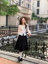 ドレープ感のある黒の不規則Aラインスカート【秋用・ハイエンドデザイン・大きいサイズ】