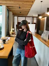 デザイン性の高い肩出し長袖ウールTシャツ【ストライプ・ハイネック・秋用】（セットアップ対応）