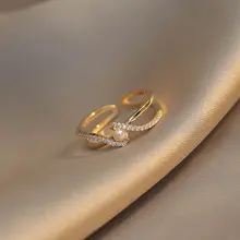 洗練されたデザインの女性用リング【インスパイア・オープンデザイン・ダイヤモンド装飾】