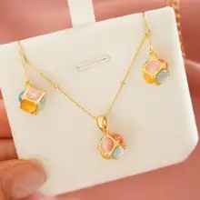 虹色キャッツアイストーンのネックレスとイヤリングのアンサンブル【ユニークで美しいデザイン】（セットアップ対応）