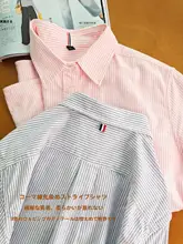 精梳コットンのストライプ柄シャツ【防巻き沿い・ボタン付き】