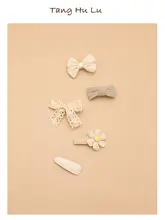 白色の蝶のヘアアクセサリー【子供用・パール付き・髪を傷めないデザイン】