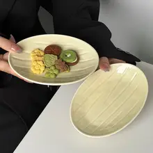 韓国風イエロー釉薬の楕円形小皿【デザートプレート・和風陶器】