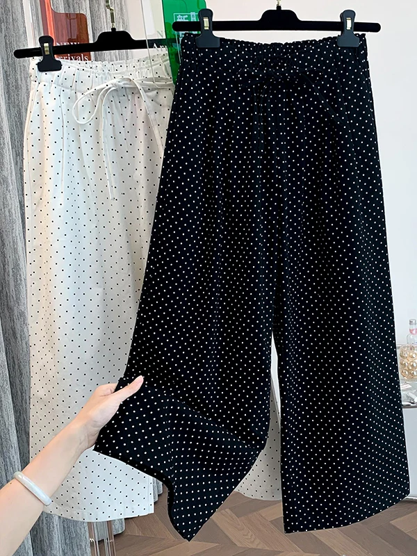 レトロデザインのブラックドットプリントストレートパンツ：夏の通勤スタイルに最適なゆったりフィットパンツ