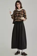 洗練されたデザインのブラックAラインスカート【通勤用・高級感】