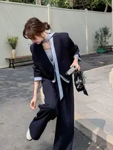 個性的なデザインのダークブルー スーツ風 ワイドパンツ（セットアップ対応）