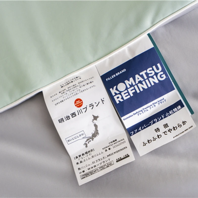 明治西川夏用クール掛け布団：涼感素材と水洗い可能な軽量設計の実用性