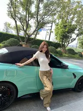 黒いストロベリーのラウンドネック透かし蝶結び短袖Tシャツ【女性用・夏用・シルエット強調・白色ウエストシェイプニット】