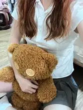 白色のリボン付きウエストシェイプポロカラーシャツ【ボタン付き・女性用・夏向け・かわいいデザイン】